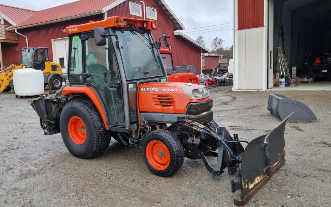 Minitraktor Kubota Snö utrustning